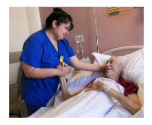 Palliative care nurse and patient