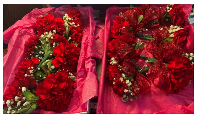 Calvary presented red carnation boutonnieres to the medical team. This is the symbolic flower for National Doctors’ Day.