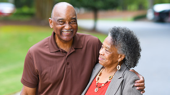 Elderly couple walking