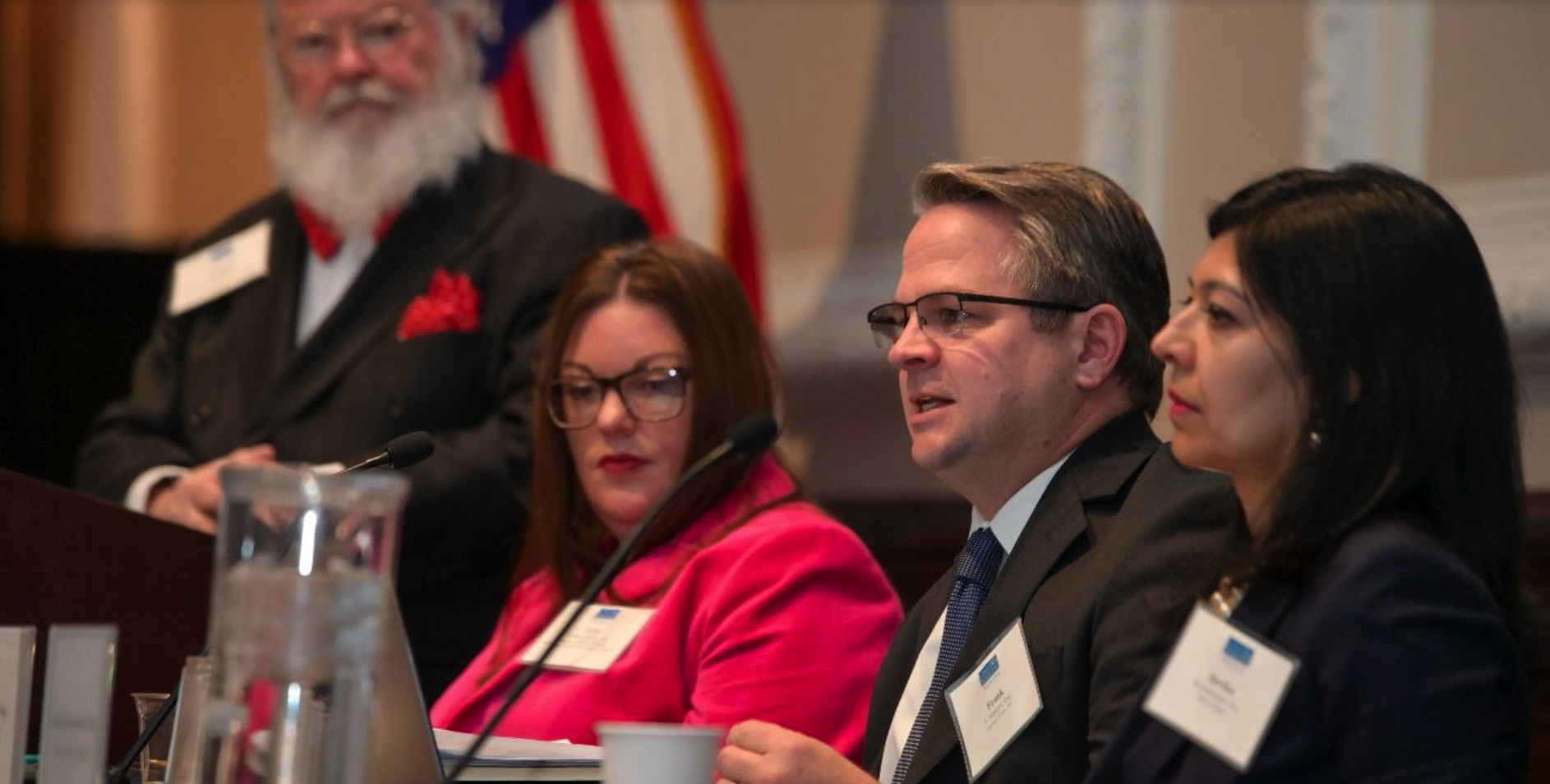 Pictured left to right: Moderator, Michael J.A. Smith, with Conference Co-Chair, Erin Gilmore Smith, Esq., and panelists, Frank T. Santoro, Esq., Partner, Farrell Fritz P.C., and Devika Kewalramani, Esq., Partner, Moses Singer.