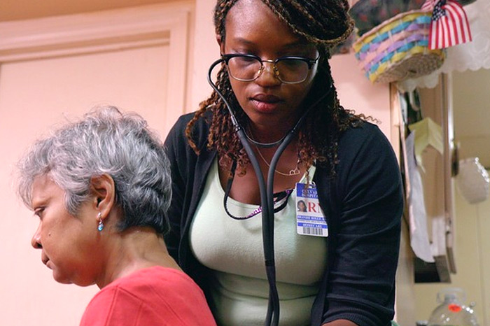 Calvary RN with patient